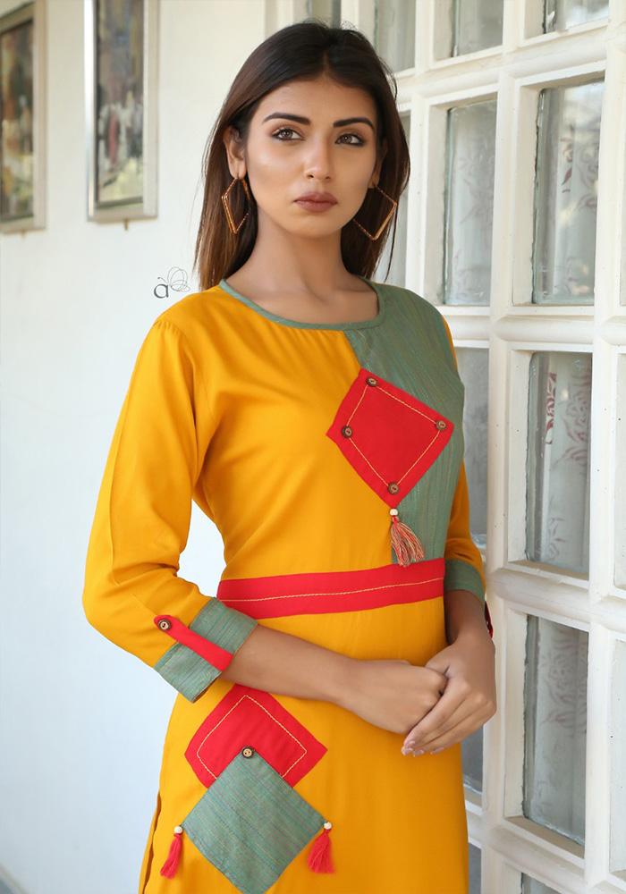 YELLOW COLOR RAYON KURTIS